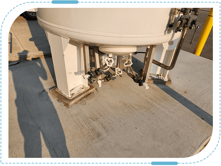 Shadow cast on concrete near tank